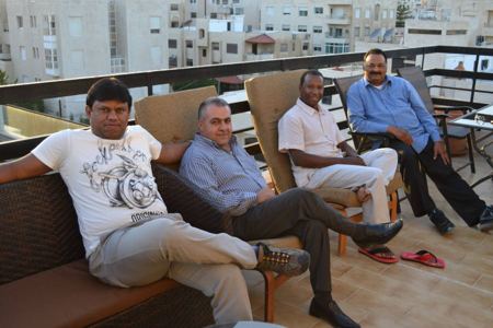 George Thomas with colleagues, 2013
